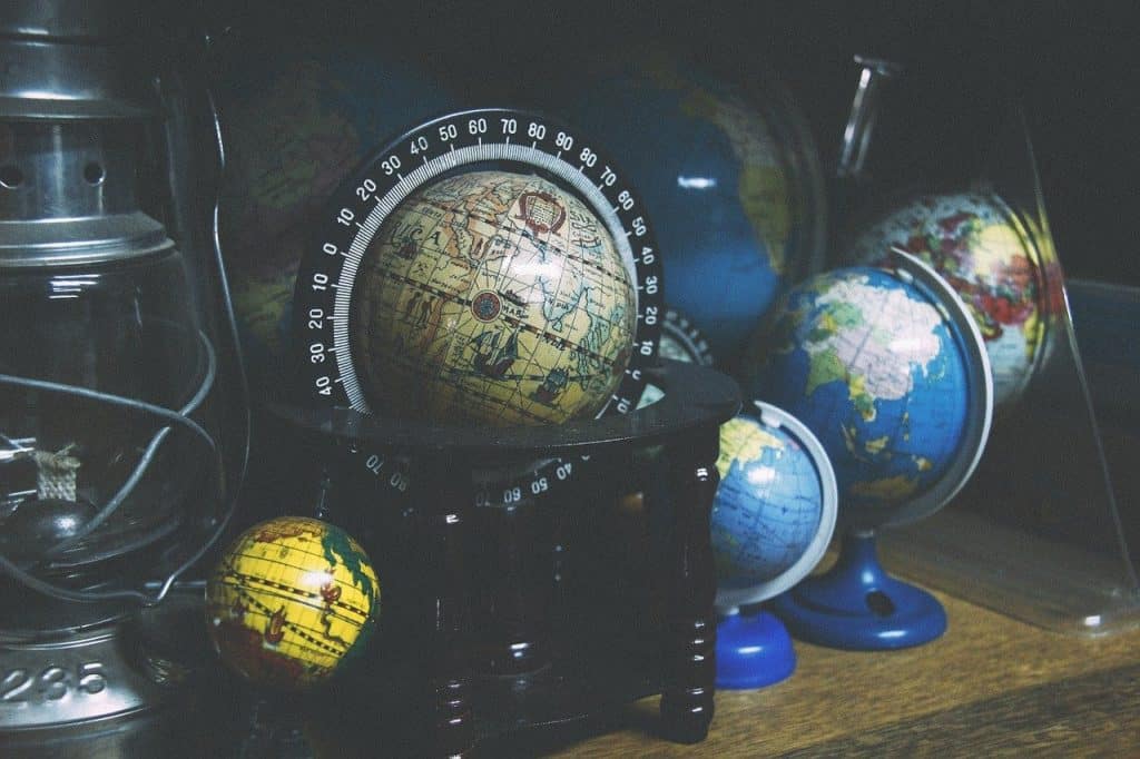 What are the astrological indicator and signs of living in a foreign country? 